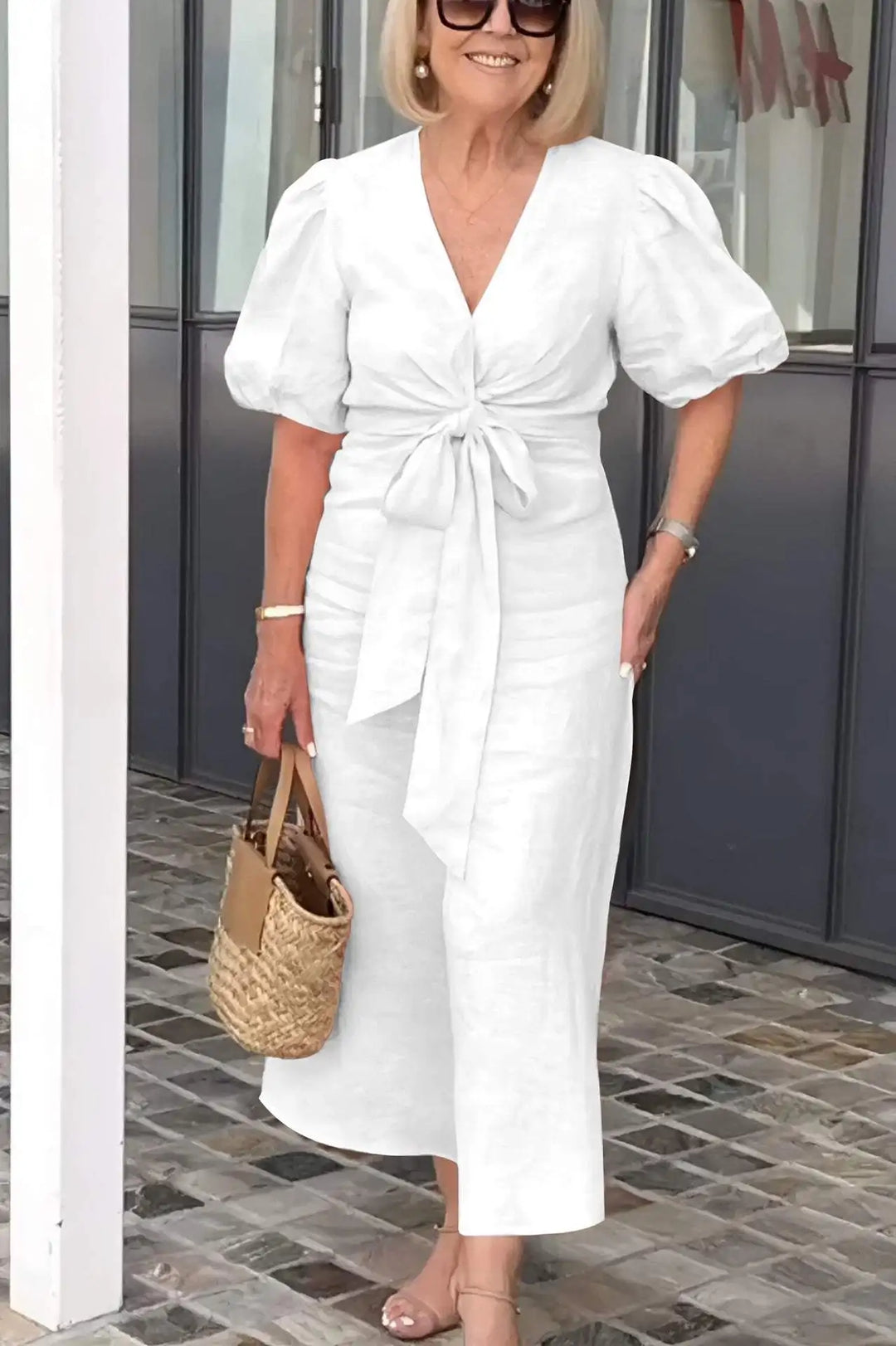 White V-neck midi dress with puff sleeves and waist tie, front view