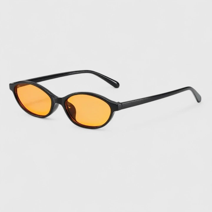 Sunglasses with black frames and amber-orange lenses, rounded cat-eye shape
