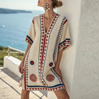 Cream V-neck beach dress with short sleeves, red and blue geometric embroidery trim