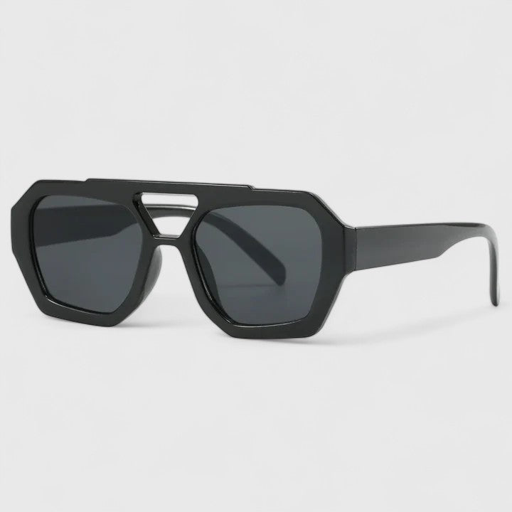 Geometric black sunglasses with dark gray lenses and silver bridge detail