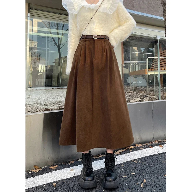 Brown corduroy midi skirt with wide belt and full gathered skirt