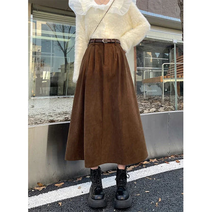 Brown corduroy midi skirt with wide belt and full gathered skirt