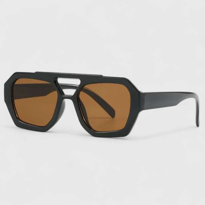 Geometric gray frame sunglasses with amber-brown lenses and angular shape
