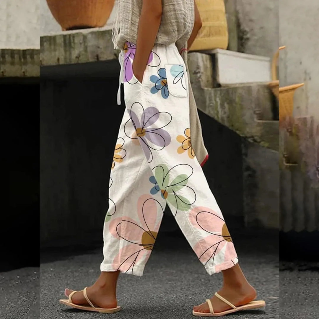 Women's summer pants, white with large colorful flower print, relaxed full-length fit