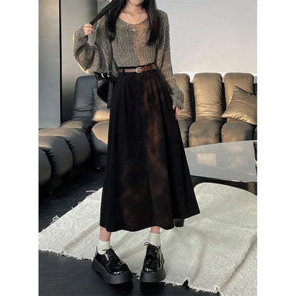 Black corduroy midi skirt with wide belt and gathered waist pleats