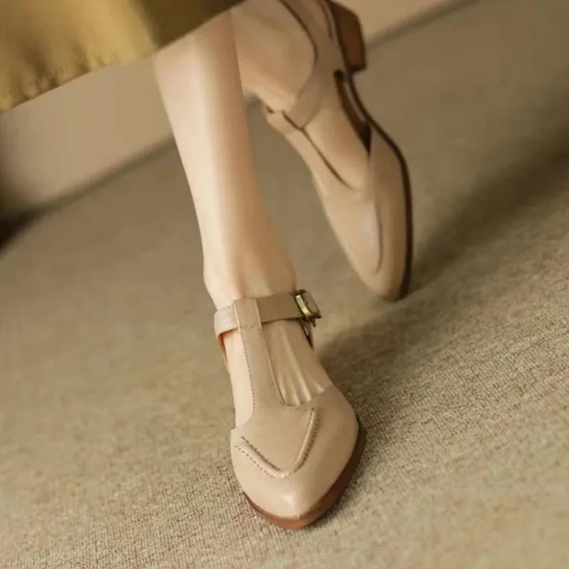 Cream buckle shoes with ankle strap and stitched rounded toe, low block heel