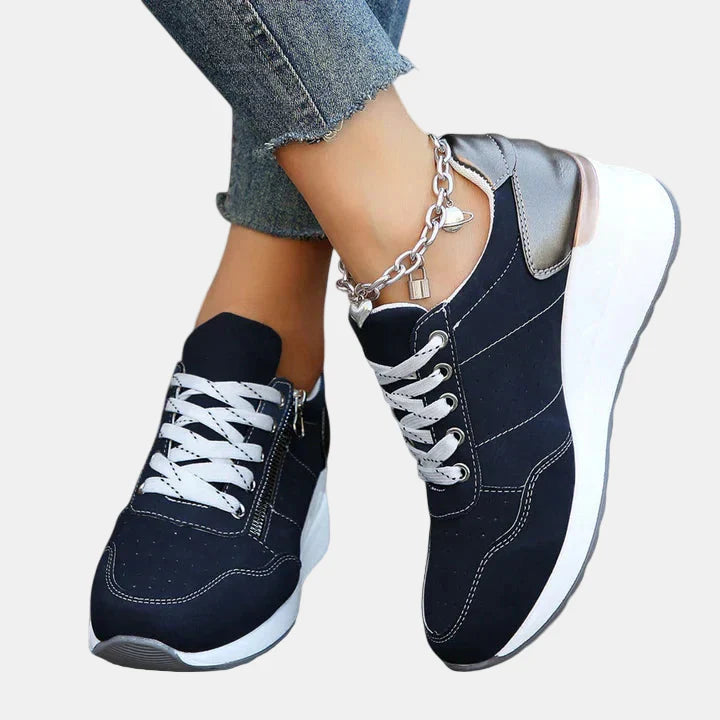 Tessa orthopedic shoes in dark blue with white laces, chunky sole, side eyelets