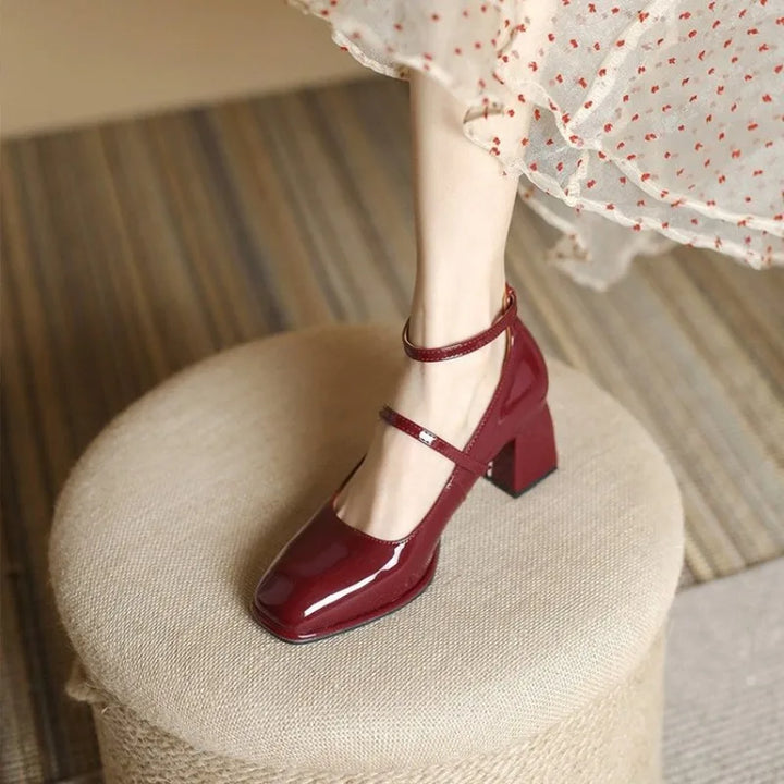 Wine red ankle-strap pumps with T-strap and low block heel, glossy finish