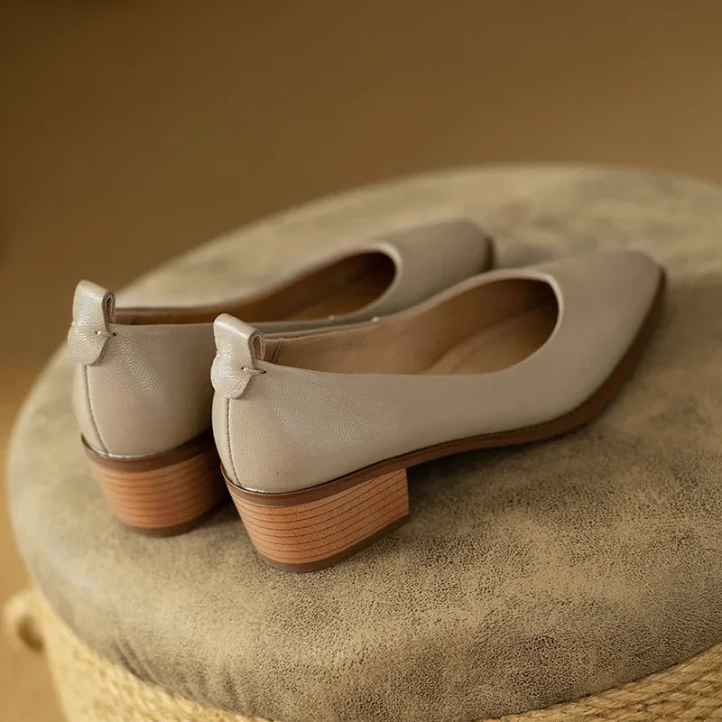 Classic pumps in beige leather-look with stacked wooden block heels, back angle