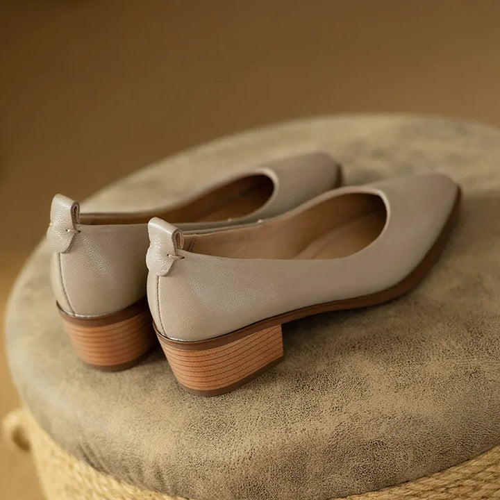 Classic pumps in beige leather-look with stacked wooden block heels, back angle