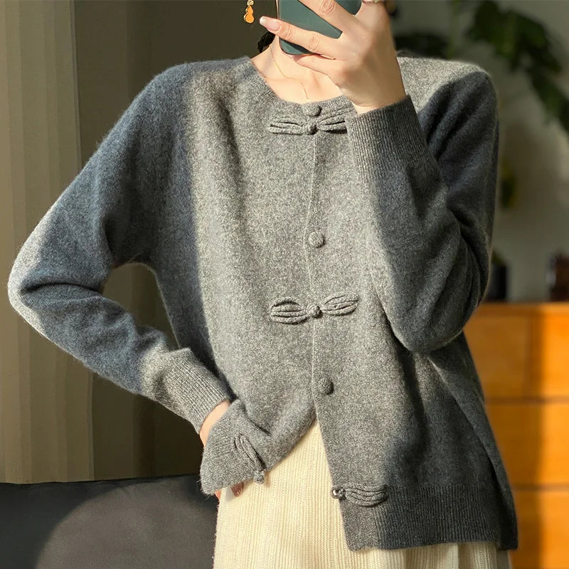 Grey bow-front cardigan with button placket and bow details