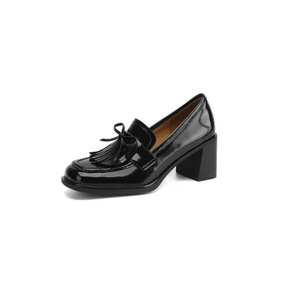 Black loafer pumps with tassel bow detail and square block heel