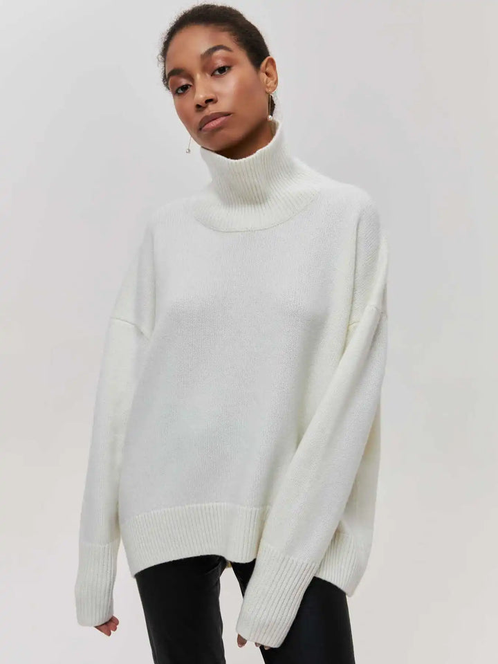 White turtleneck sweater with ribbed high neck and long sleeves, relaxed style