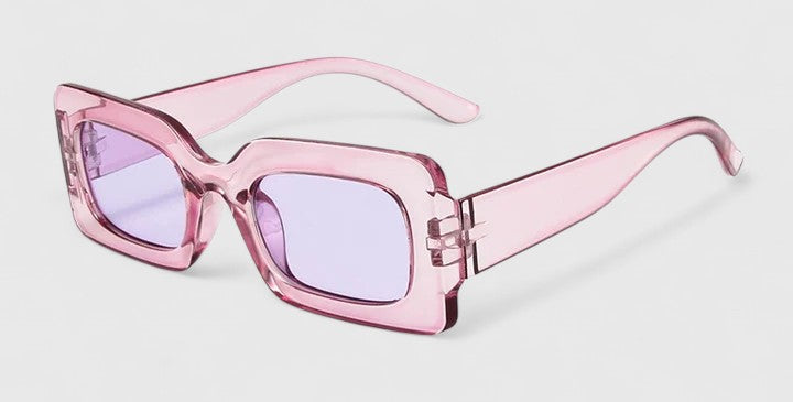 Elyanna sunglasses, translucent pink frames with light purple tinted lenses