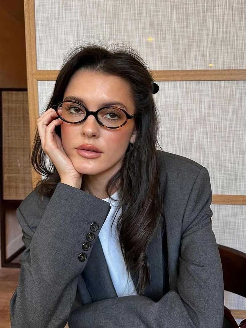 Reading glasses with black round frames and slim metal accents