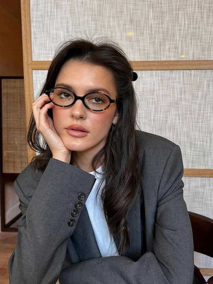 Reading glasses with black round frames and slim metal accents