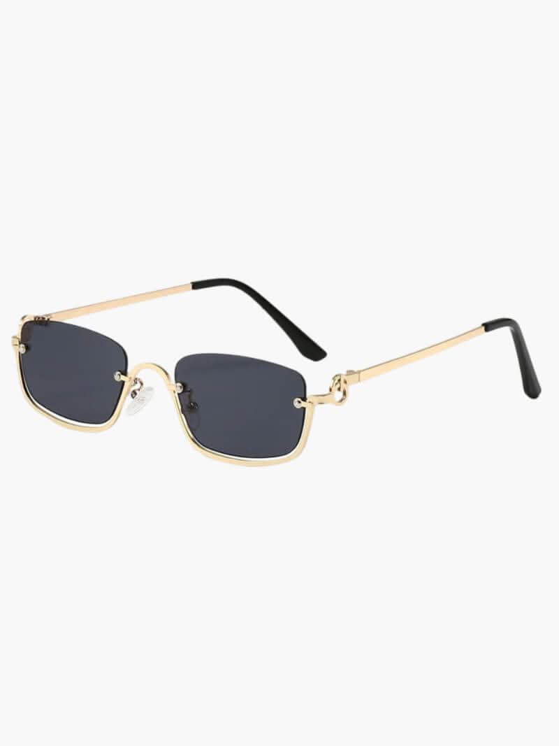 Gold-tone sunglasses with dark lenses and black temples, semi-rimless frame.