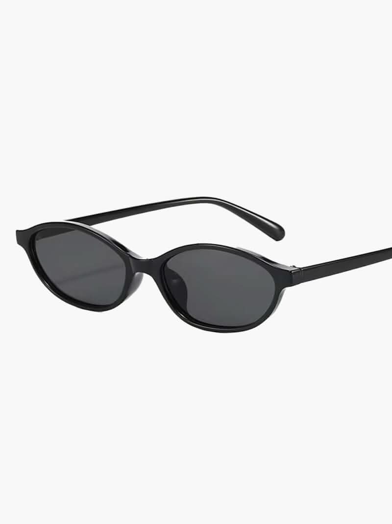 Romantic sunglasses, black frames with dark lenses
