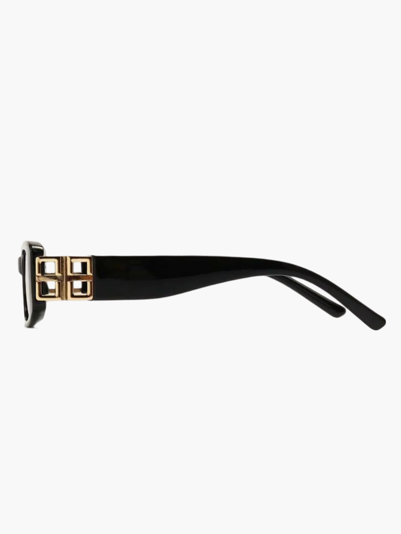 Black sunglasses temple end with gold square hinge detail and dark lens frame