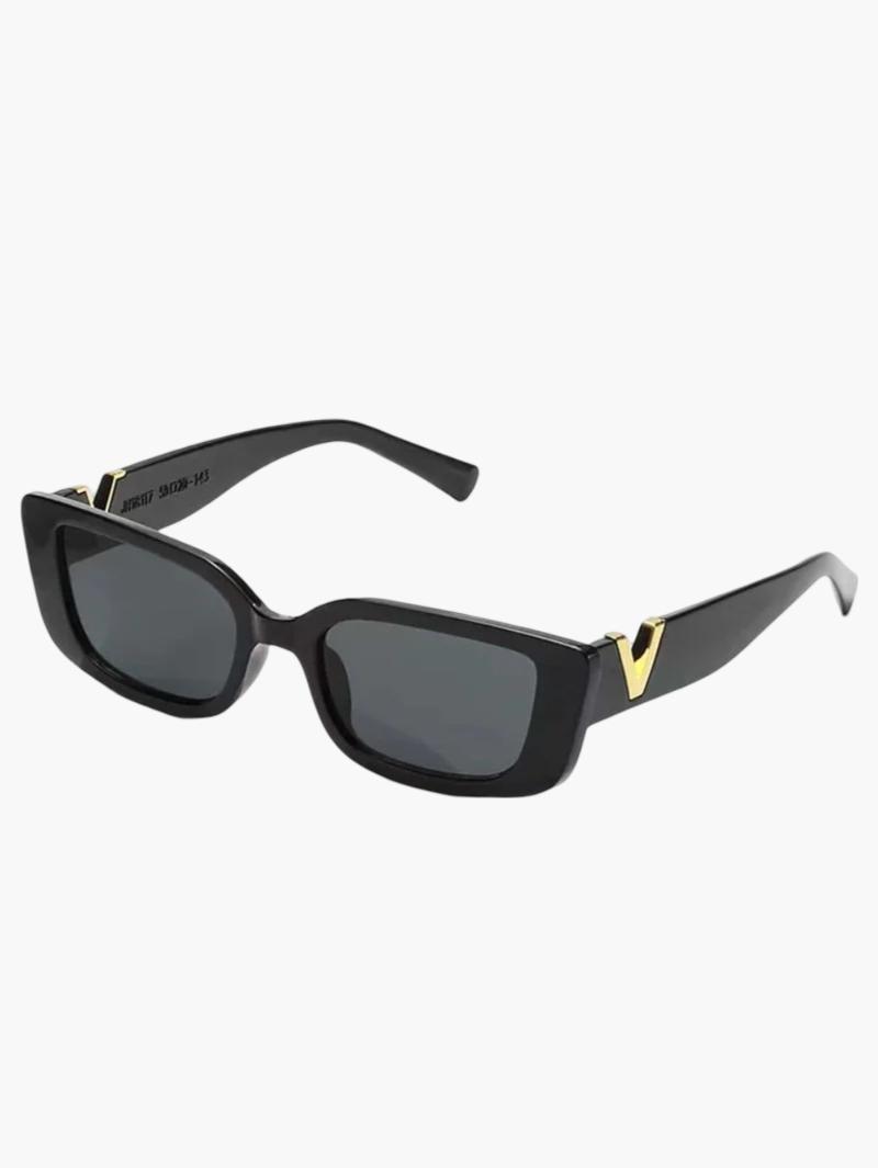Black sunglasses angled view with dark lenses and gold V metal temple detail.