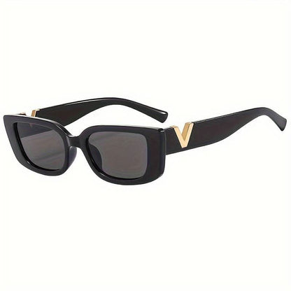Black sunglasses with dark lenses and gold V metal detail, 3/4 angle.