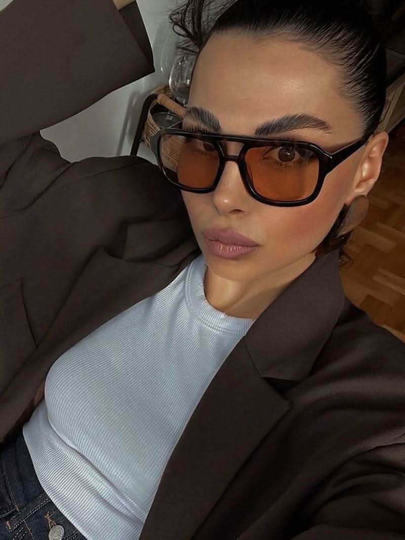 Tortoiseshell black square sunglasses with amber lenses