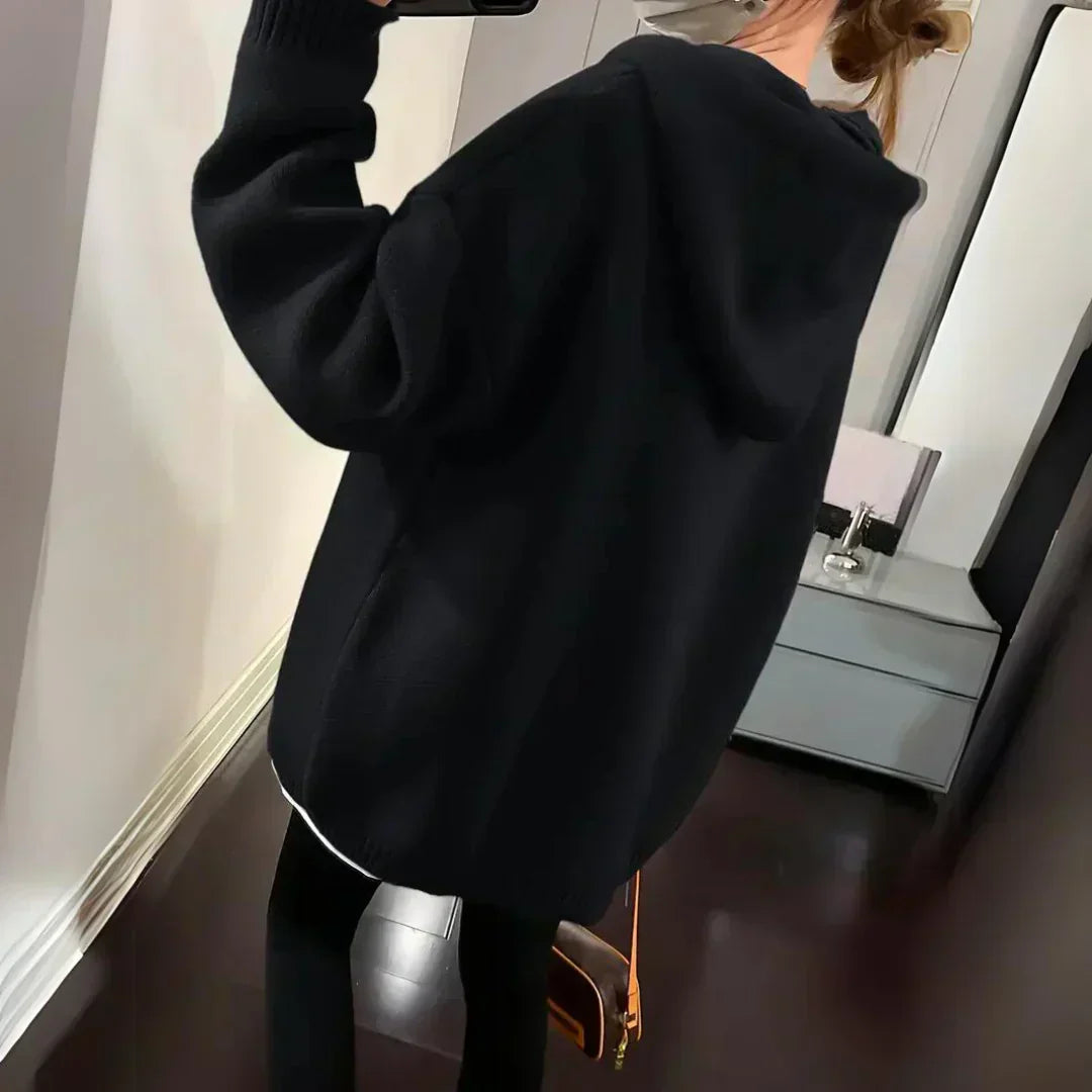Black oversized hoodie back view with ribbed hem and long sleeves
