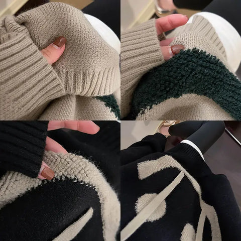 Oversized hoodie close-up: ribbed knit cuffs/hem and smiley face graphic detail