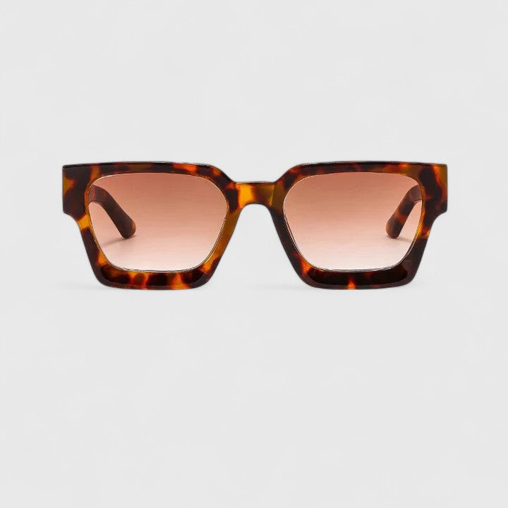 Leopard tortoiseshell sunglasses with square frames and blush-tinted lenses