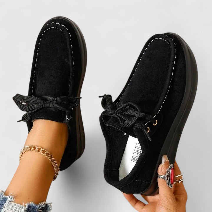 Lya orthopedic shoes in black, lace-up sneakers with thick sole and stitched panels