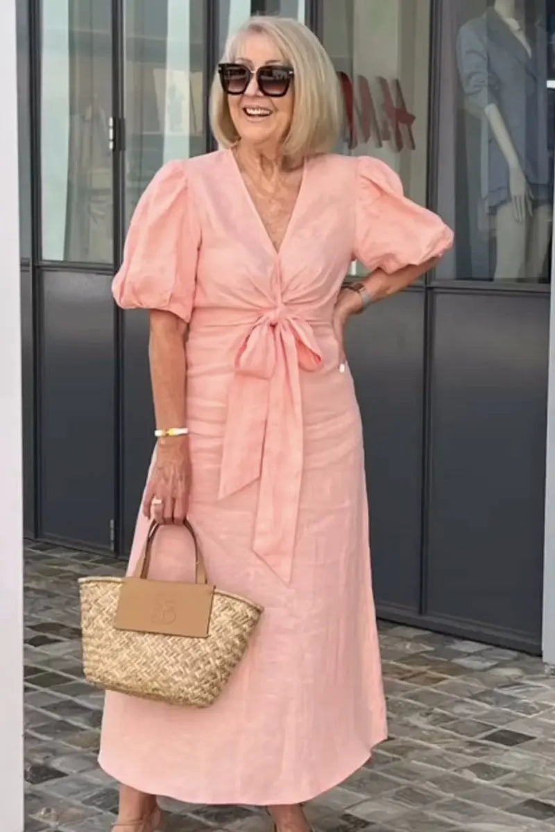 Peach V-neck midi dress with puff sleeves and waist tie
