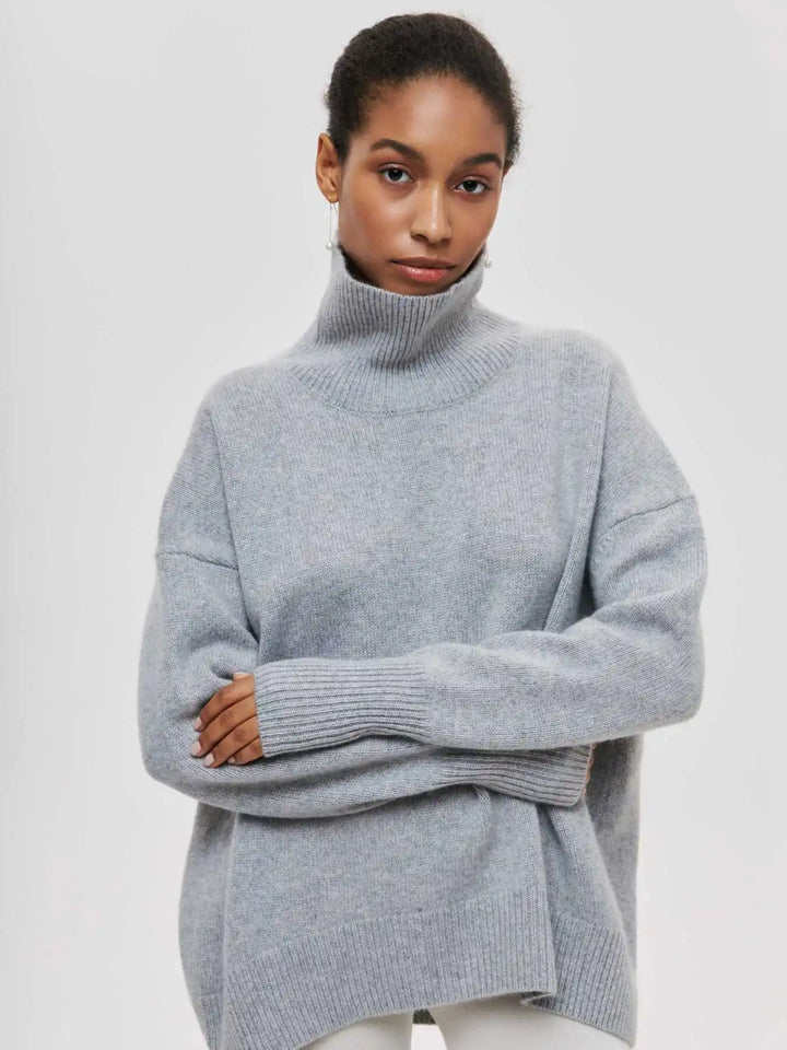Gray turtleneck sweater with ribbed knit texture, high neck, long sleeves