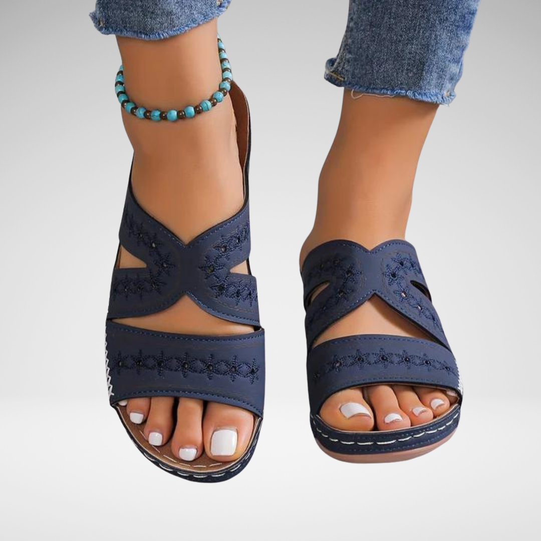 Orthopedic sandals with navy blue wide straps and cutout toe, low cushioned sole