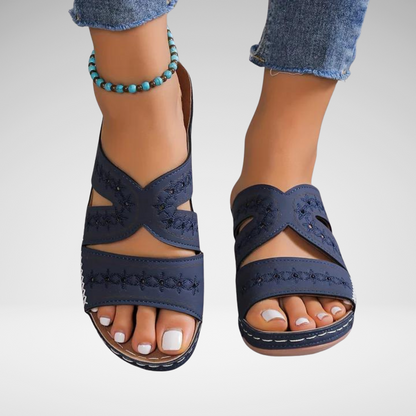 Orthopedic sandals with navy blue wide straps and cutout toe, low cushioned sole