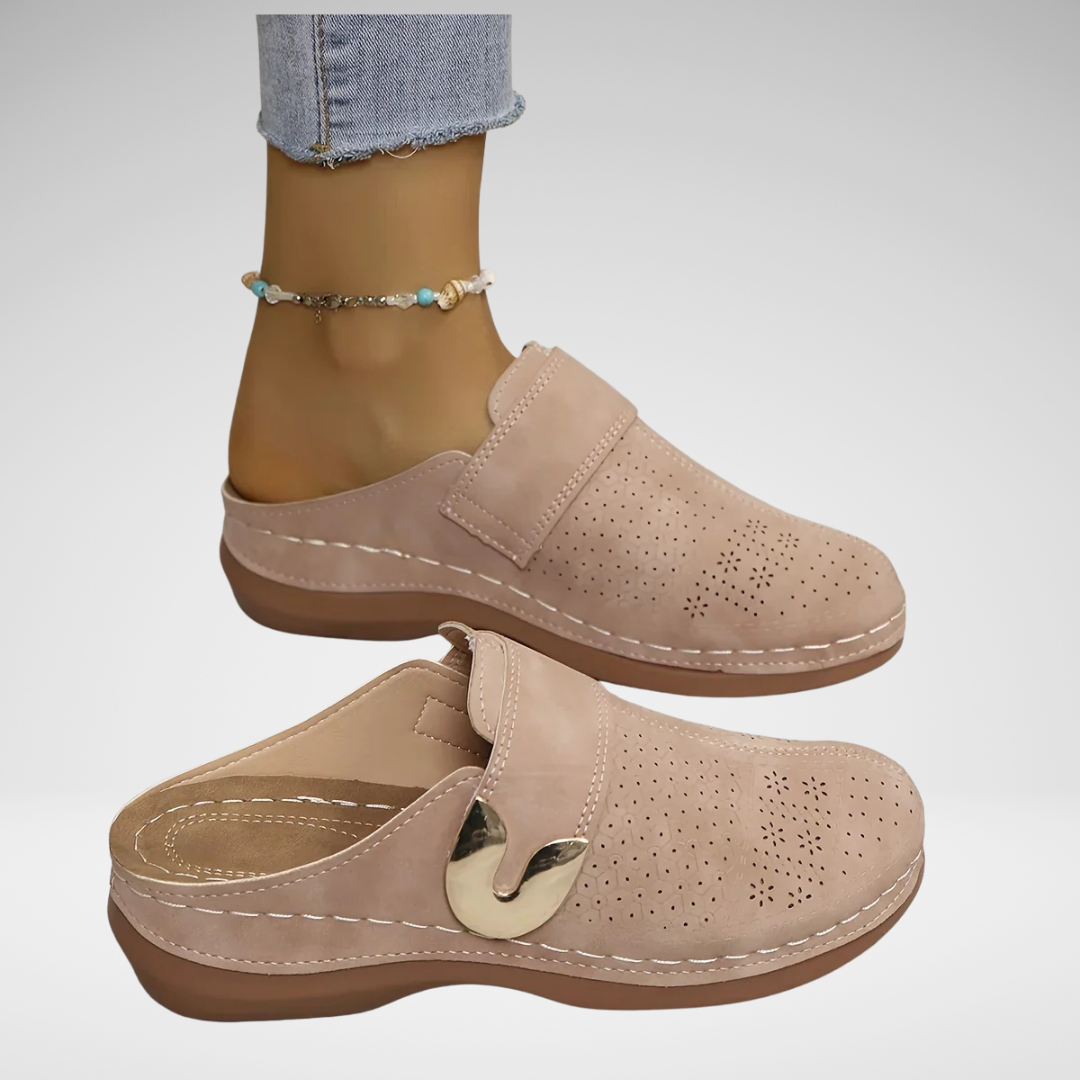 Pale pinkish-beige perforated wedge sandals with side strap and gold-tone buckle