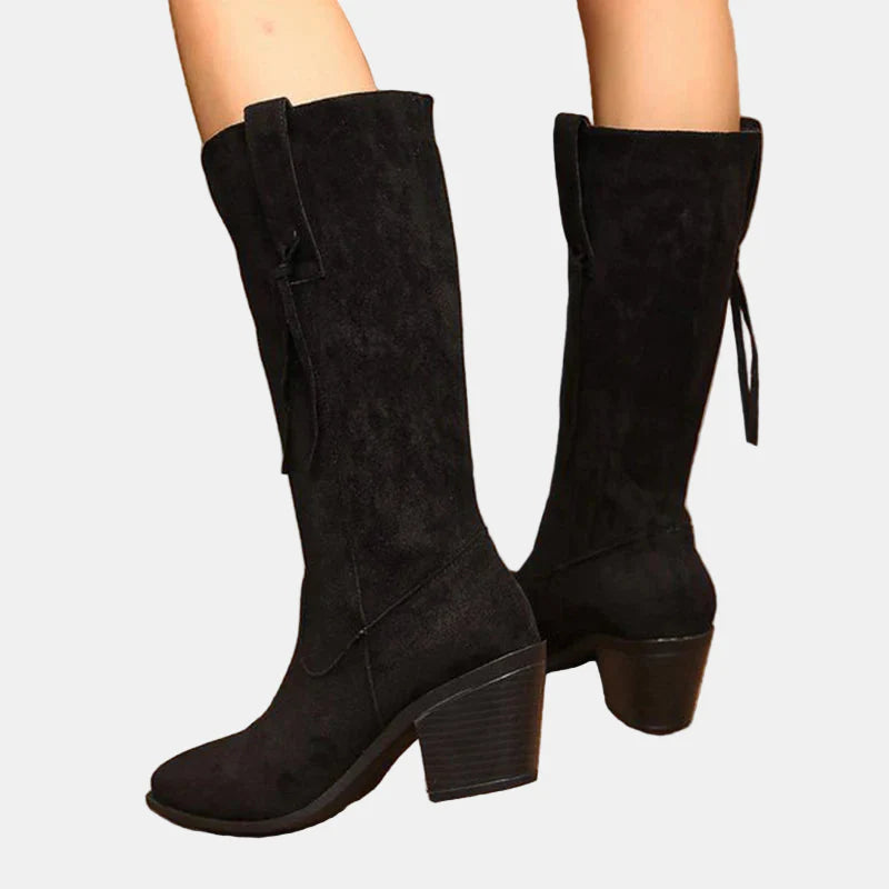 Black mid-calf faux suede boots with tassel tie detail and chunky block heel