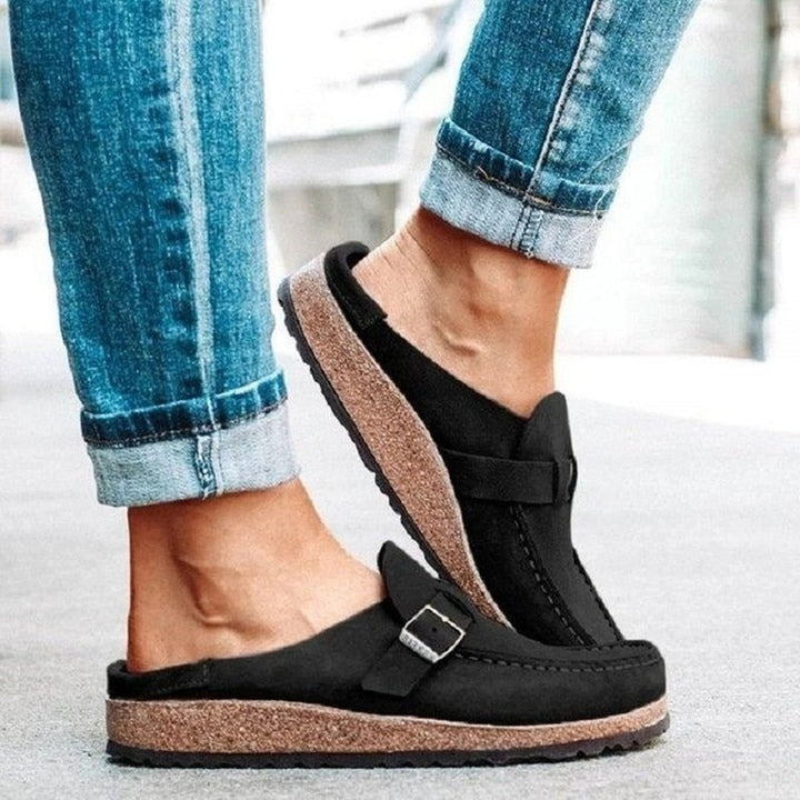 Heidi orthopedic slippers in black suede with strap and silver buckle detail