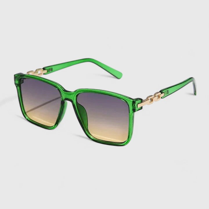 Square green sunglasses with tinted gradient lenses and gold chain hinge detail