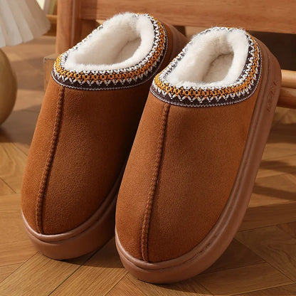 Brown platform slippers with white faux-fur collar and stitched knit trim