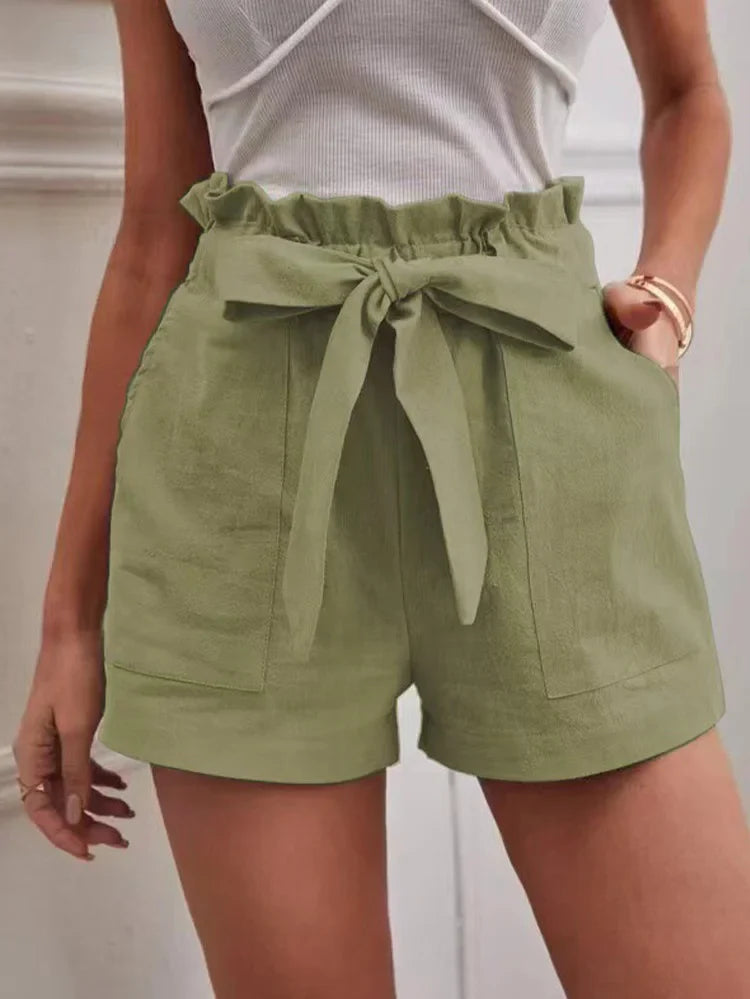 Olive green paper-bag shorts with bow tie, ruffled elastic waist, side pockets.