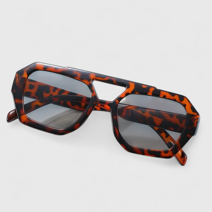 Sunglasses with tortoise square frames and dark gray tinted lenses