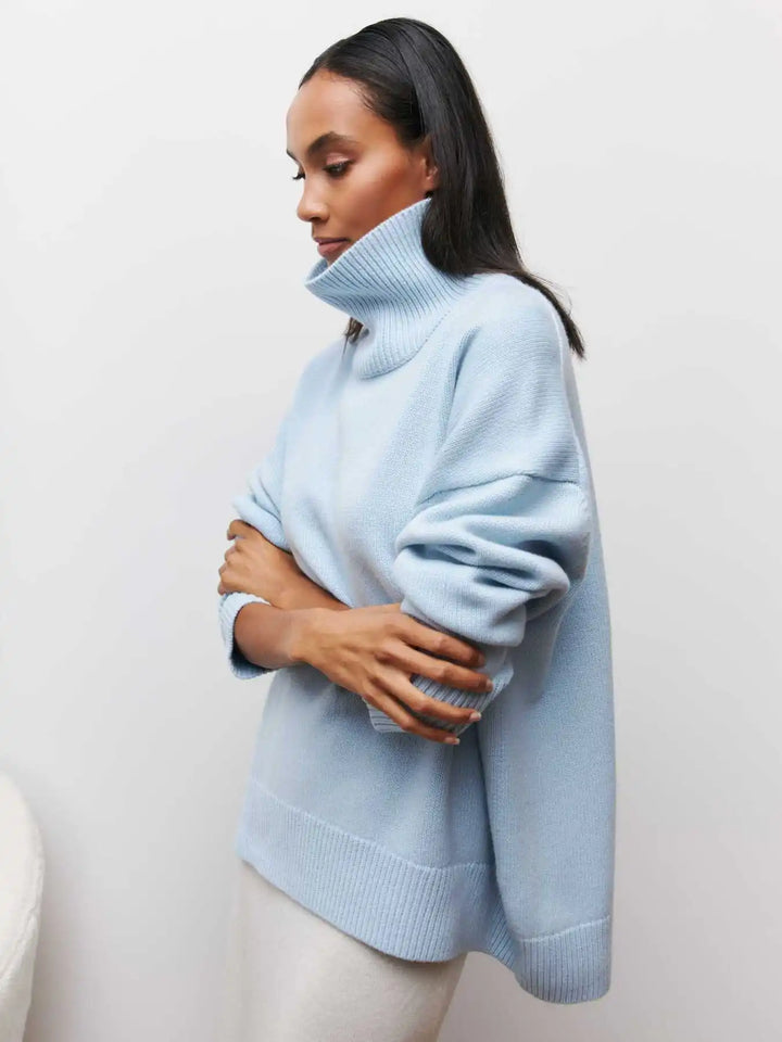 Light blue turtleneck sweater with ribbed high neck and long sleeves