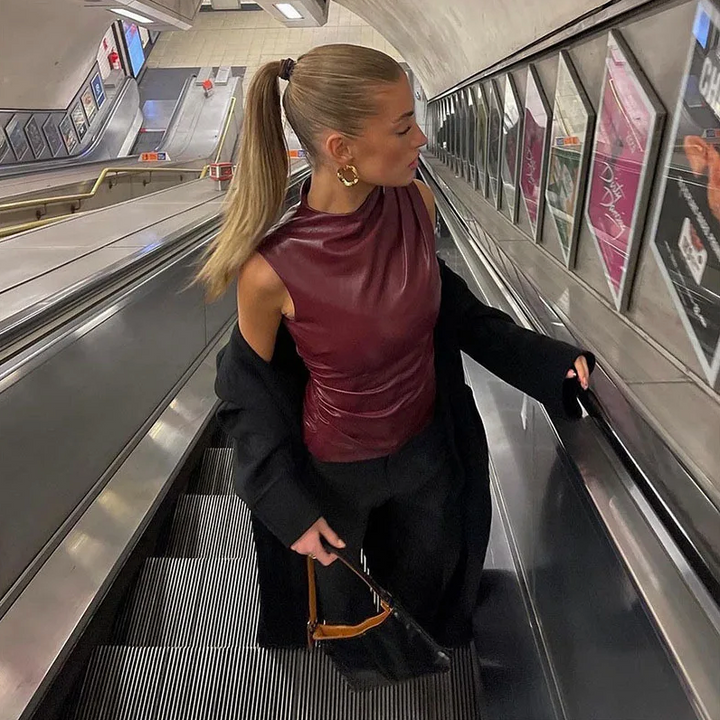 Women’s sleek faux leather top, sleeveless burgundy with high collar and fitted waist