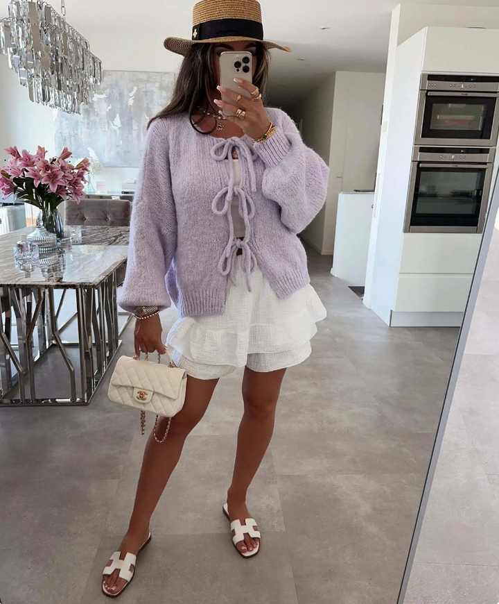 Lilac knitted bow cardigan with front bow ties and cozy chunky knit.