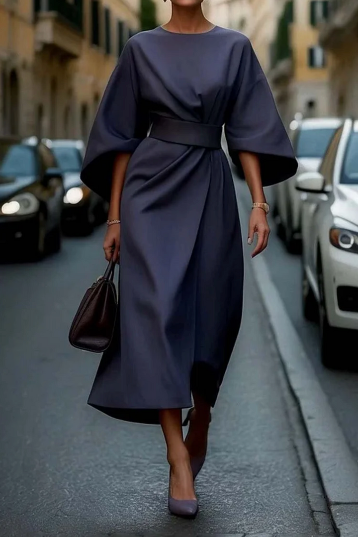 Navy blue lantern-sleeve midi dress with wrap tie at the waist