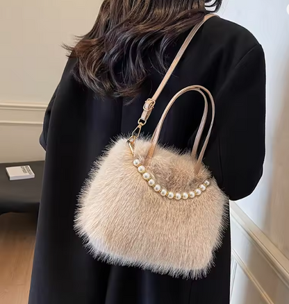 Beige faux fur crossbody bag with pearl-bead trim and double shoulder strap