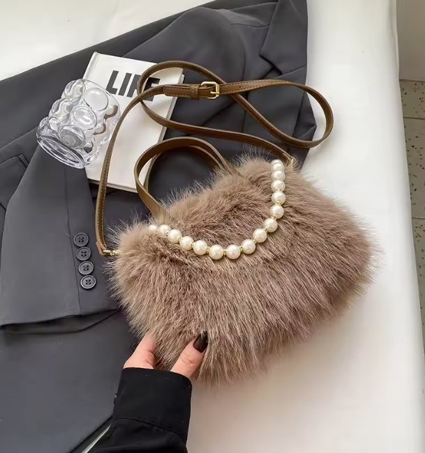 Brown faux fur crossbody bag with pearl-bead trim and adjustable shoulder strap
