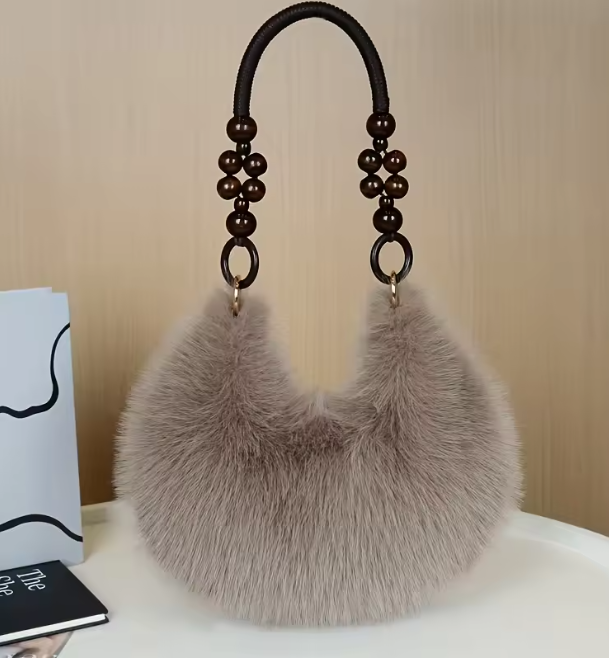 Maine faux hobo handbag with gray faux-fur body and beaded handles with rings