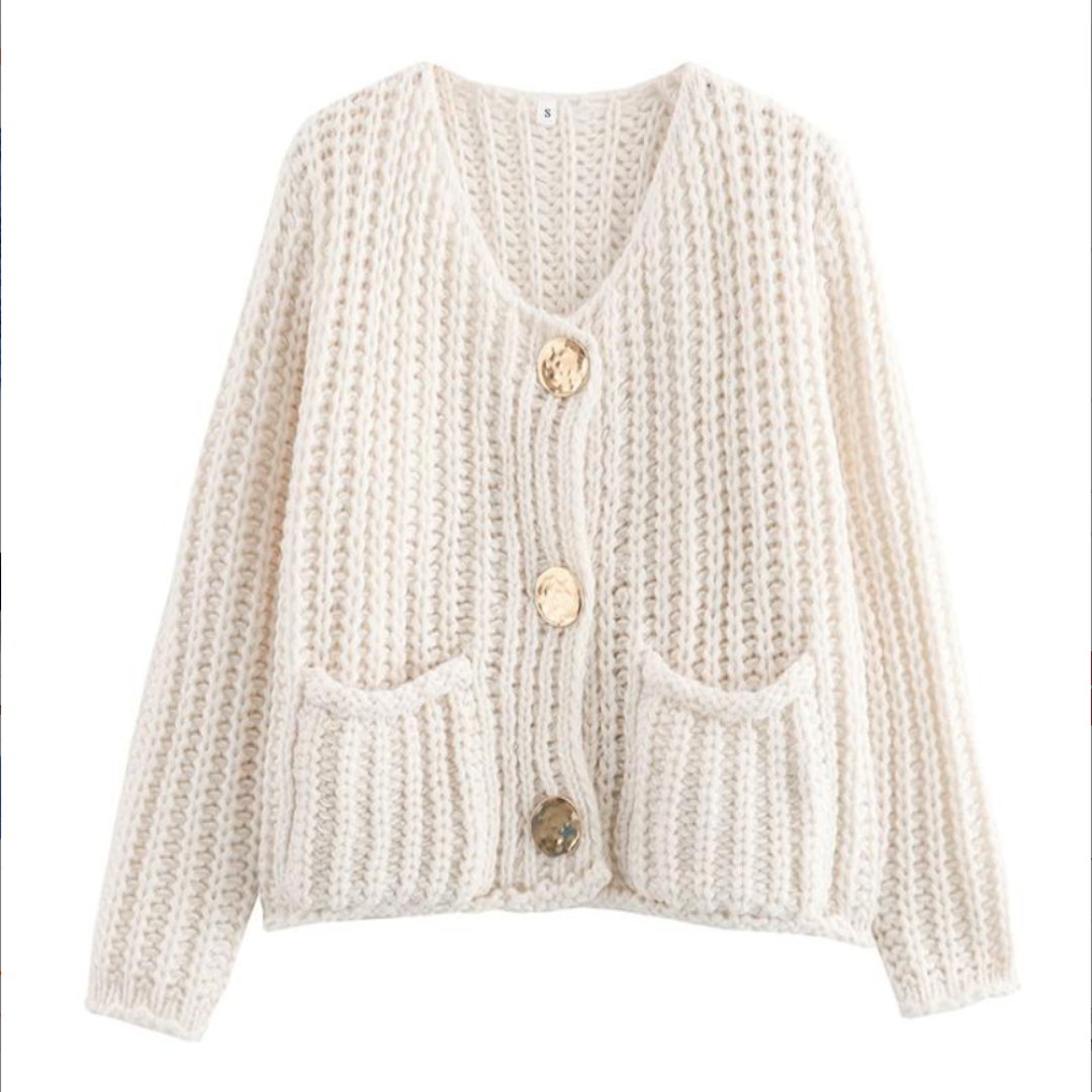 Beige chunky knit cropped cardigan with V-neck, button front, and patch pockets