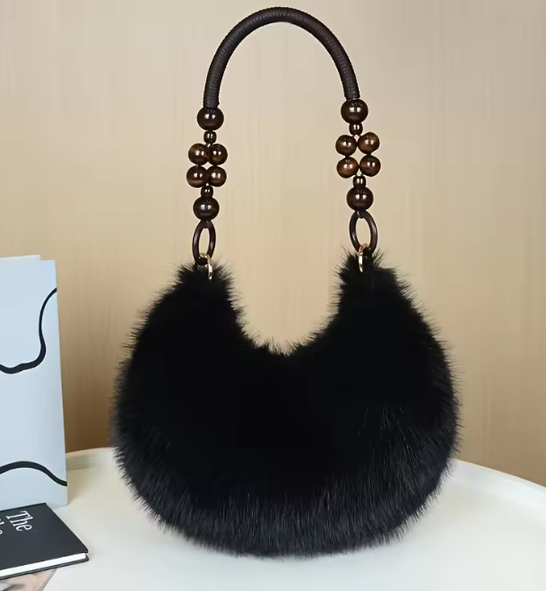 Maine faux hobo handbag with black faux-fur body and beaded beadwork handles